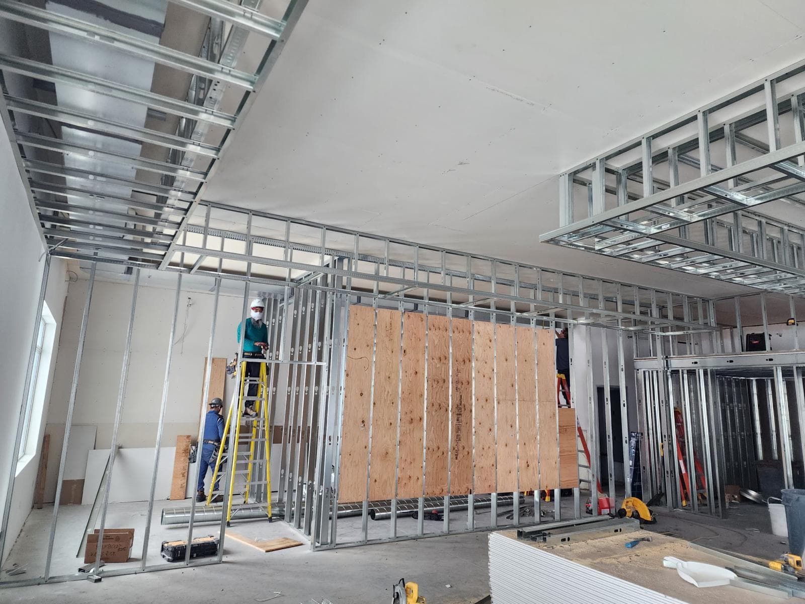 Custom bulkhead ceiling construction by Dil Chahal Construction in Saskatoon