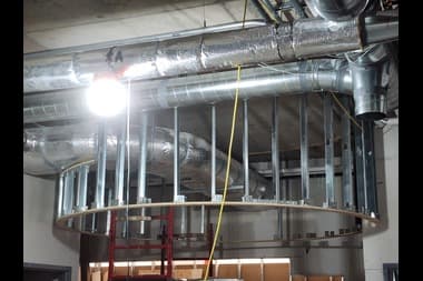 Custom bulkhead ceiling construction adding dimension and style in Saskatoon